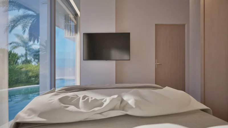 Bedroom of a pool-access apartment at Millennium