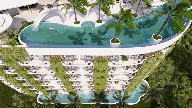 Millennium rooftop pool with palms and a slide